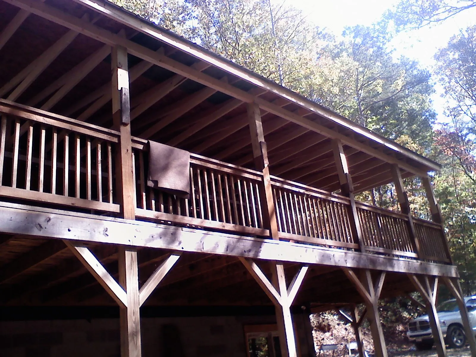 Timber framing under a new elevated porch and deck — Roof Leak Repair in West Chesterfield by Roofing Brothers